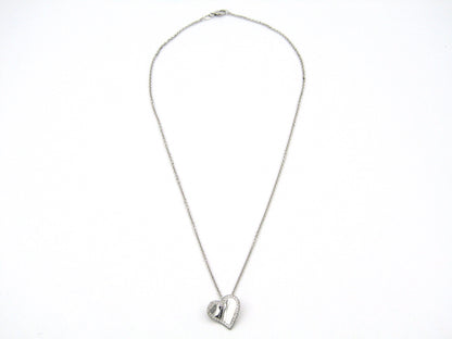 18K gold diamond heart pendant.