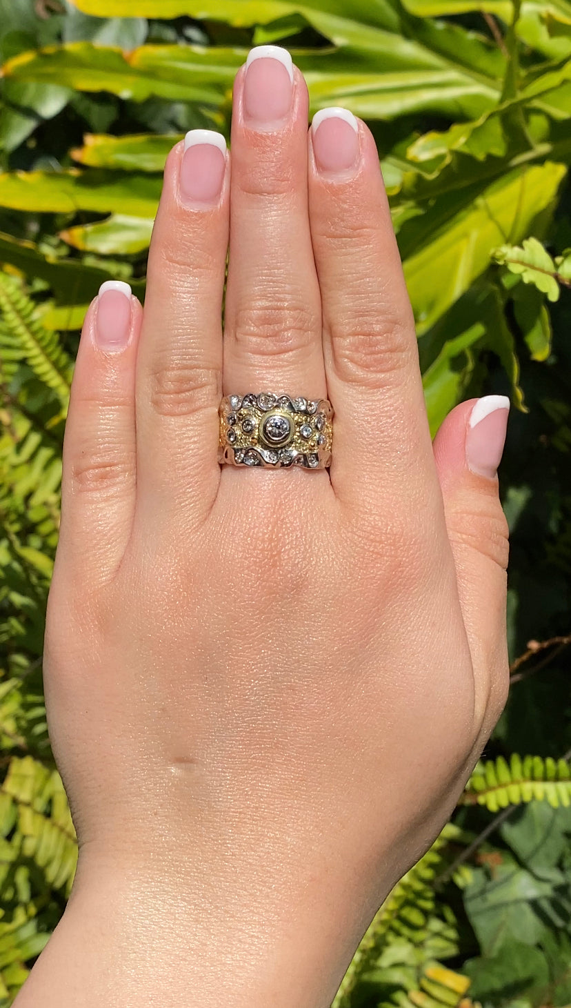 18K gold diamond ring.