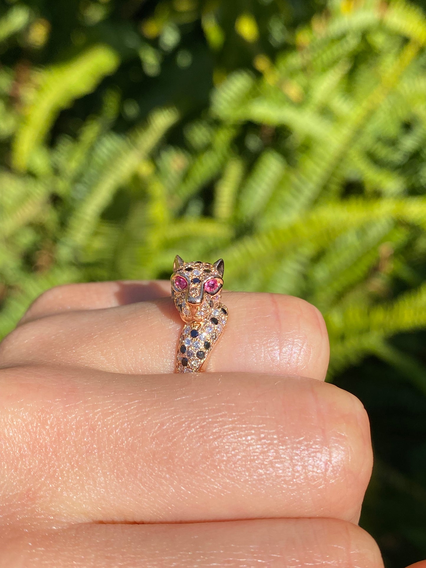 18K gold ruby and diamond leopard ring.