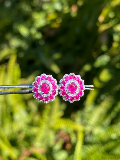 18K gold ruby and diamond earrings.