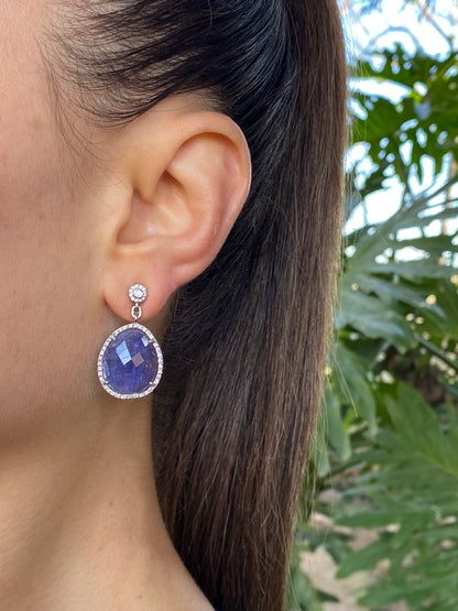 18K gold tanzanite and diamond drop earrings by Jack Friedman.