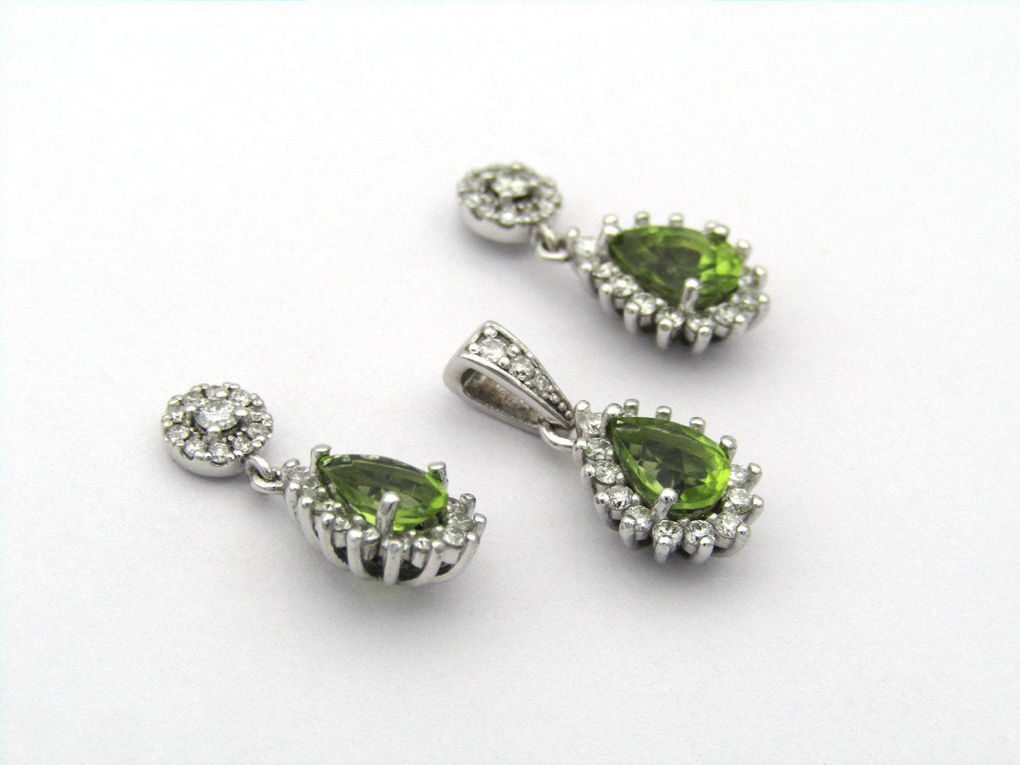 18K gold peridot and diamond earrings and pendant.