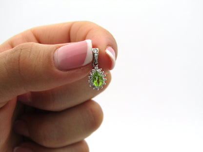 18K gold peridot and diamond earrings and pendant.
