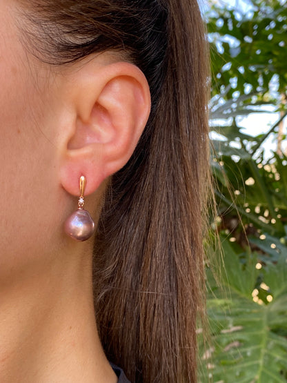 9K gold freshwater pearl and diamond dangle earrings.