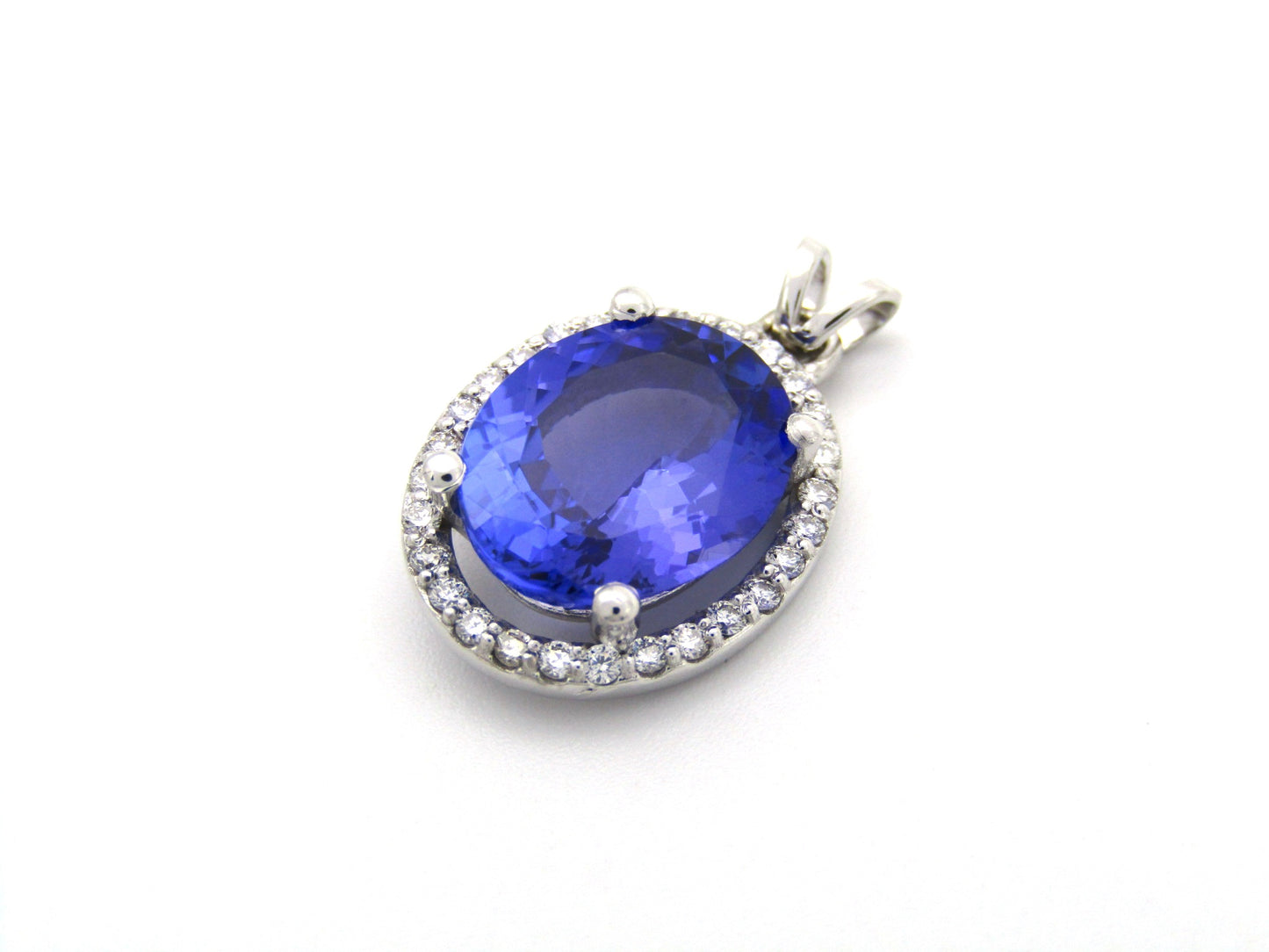 18K gold tanzanite and diamond pendant.