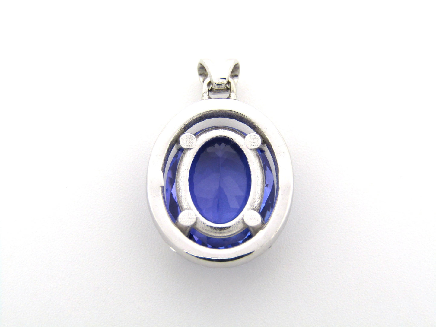 18K gold tanzanite and diamond pendant.