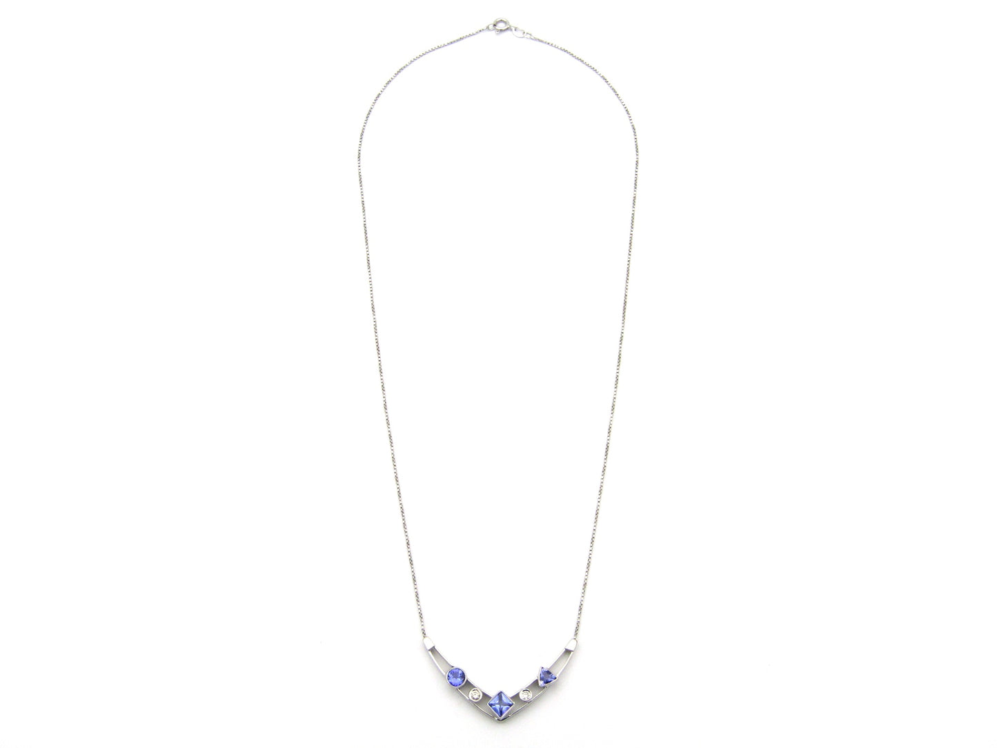 18K gold tanzanite and diamond necklace.