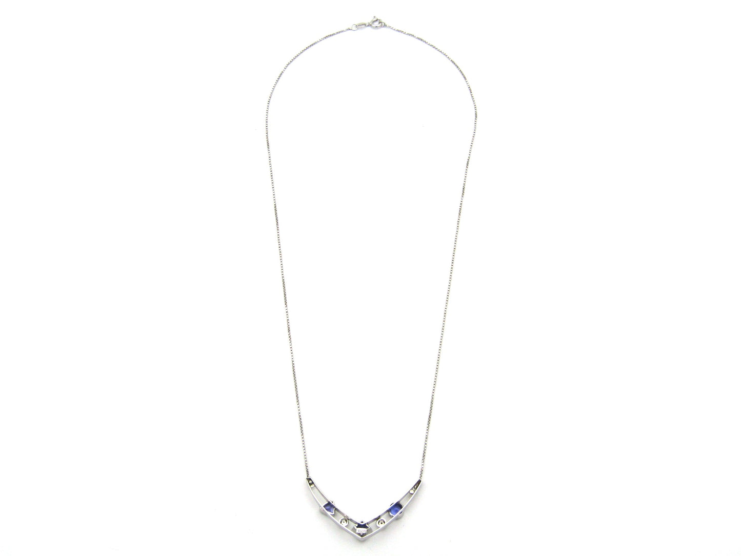 18K gold tanzanite and diamond necklace.