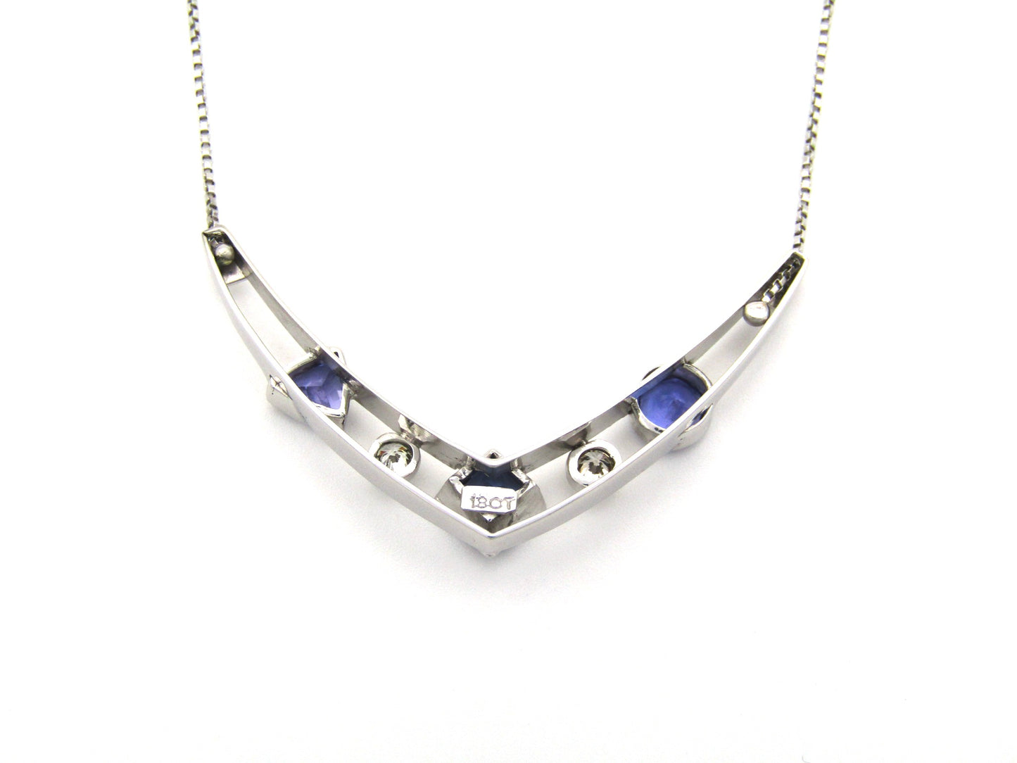 18K gold tanzanite and diamond necklace.