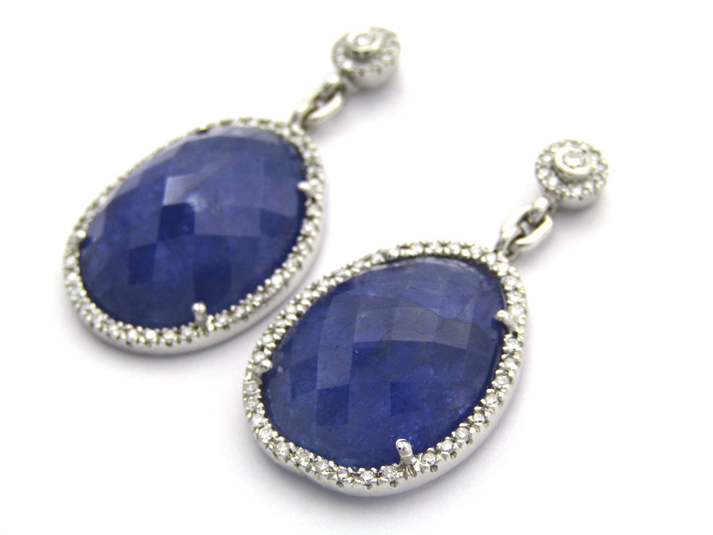18K gold tanzanite and diamond drop earrings by Jack Friedman.