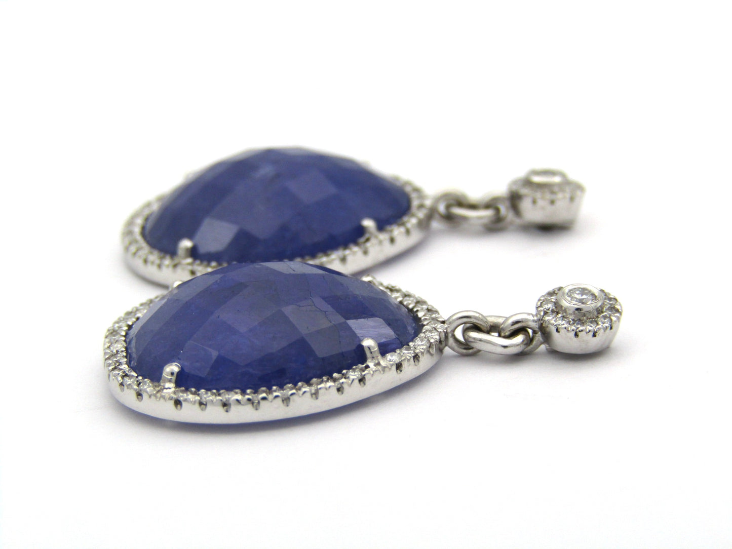 18K gold tanzanite and diamond drop earrings by Jack Friedman.