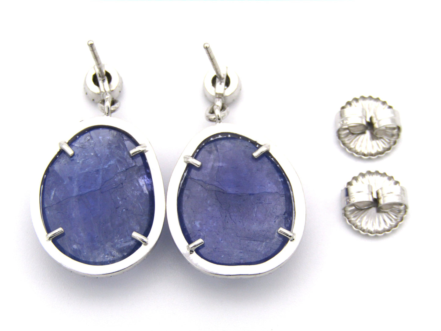 18K gold tanzanite and diamond drop earrings by Jack Friedman.