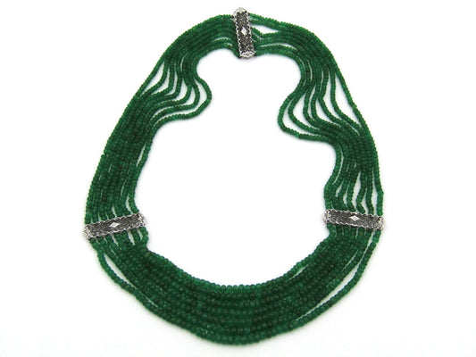 14K gold diamond and 7 strand emerald necklace.