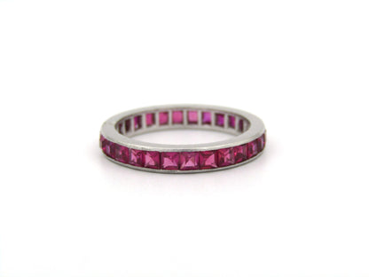 Platinum synthetic ruby eternity ring, circa 1990's.