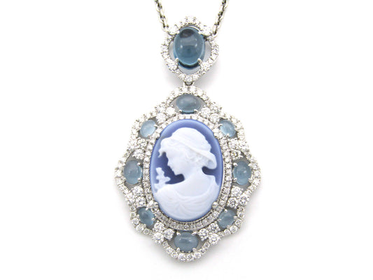 18K gold agate cameo, blue topaz and diamond pendant.