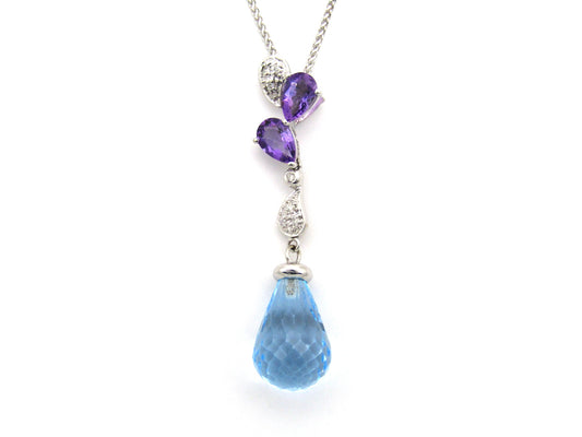 18K gold blue topaz, amethyst, and diamond pendant.