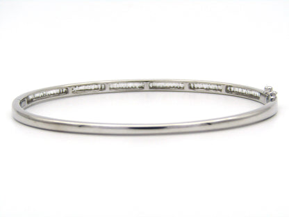 18K gold diamond bangle.