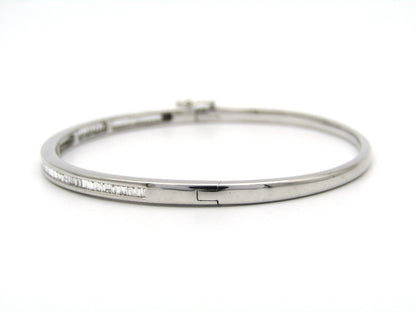 18K gold diamond bangle.