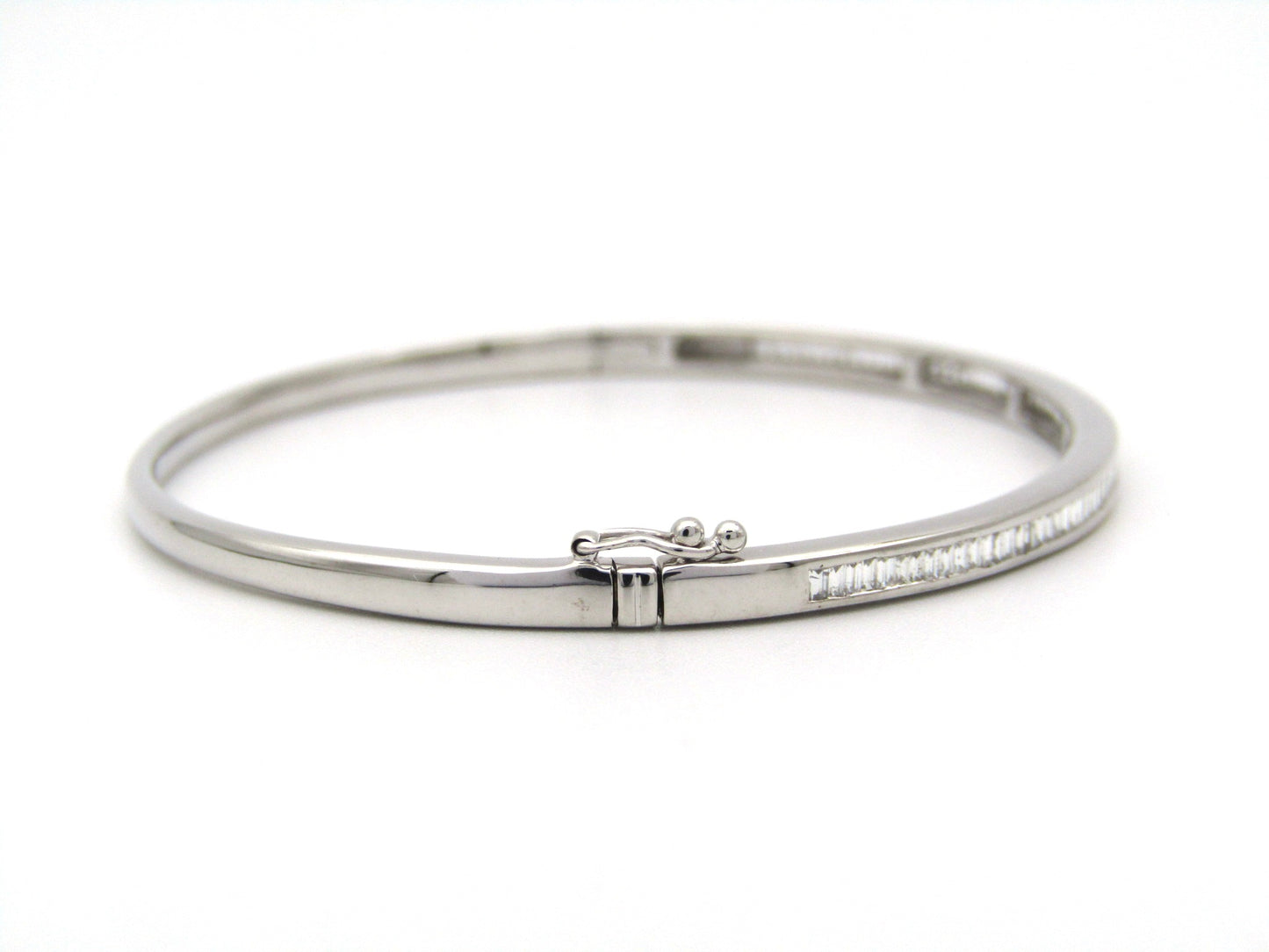 18K gold diamond bangle.
