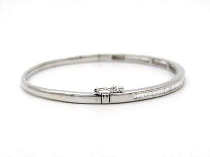 18K gold diamond bangle.