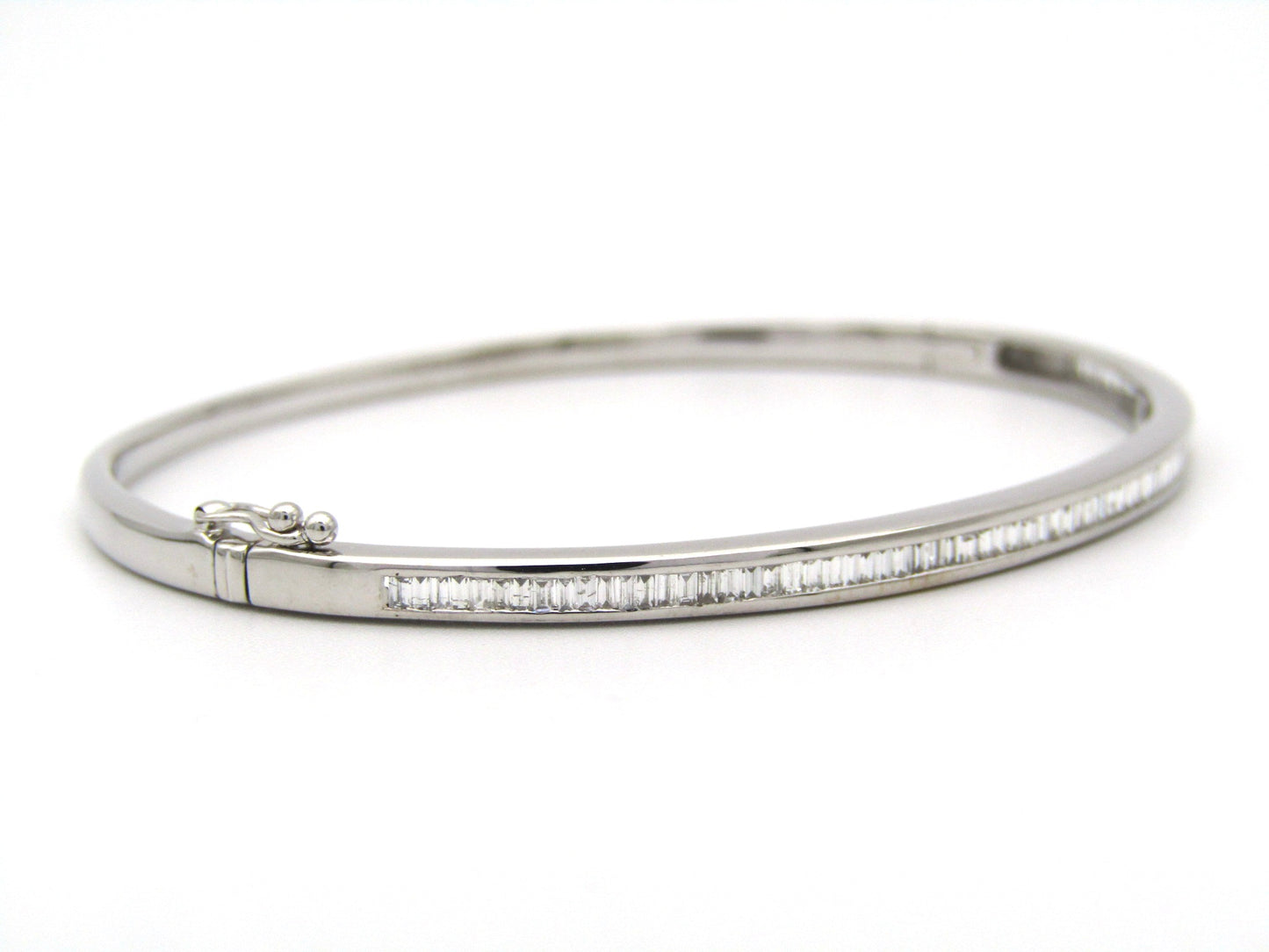 18K gold diamond bangle.