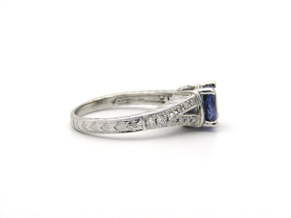 14K gold sapphire and diamond ring.