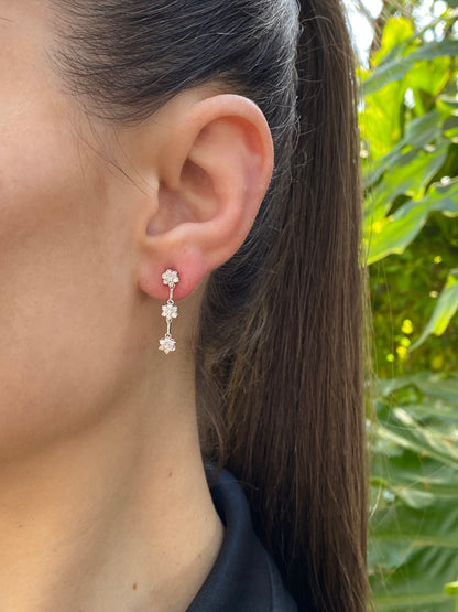 18K Gold diamond flower drop earrings by Browns
