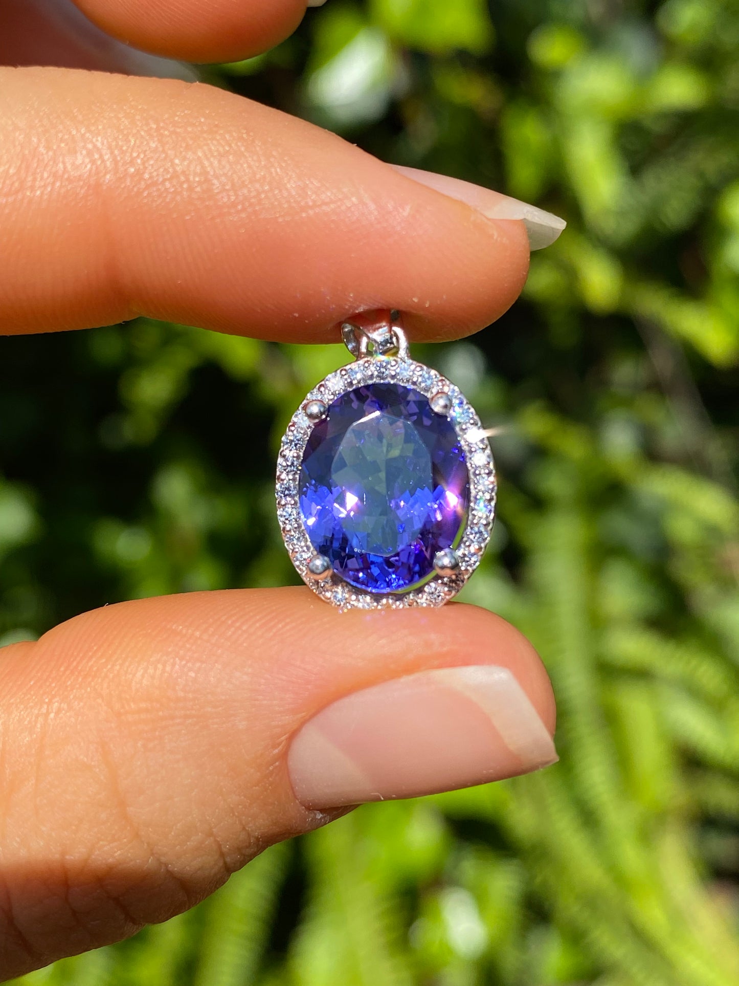 18K gold tanzanite and diamond pendant.