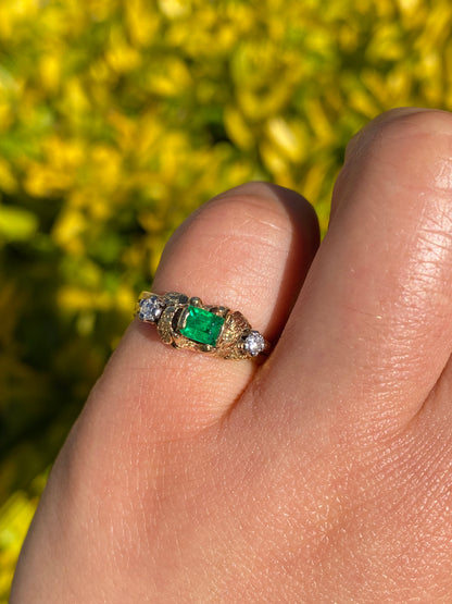 18K gold emerald and diamond ring, circa 1940's.