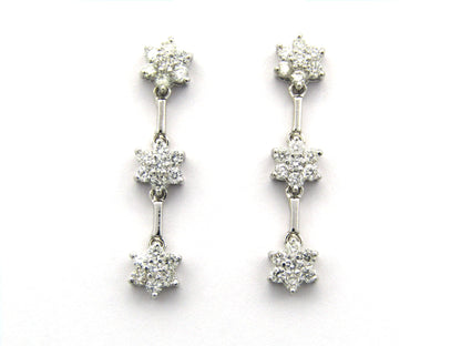 18K Gold diamond flower drop earrings by Browns
