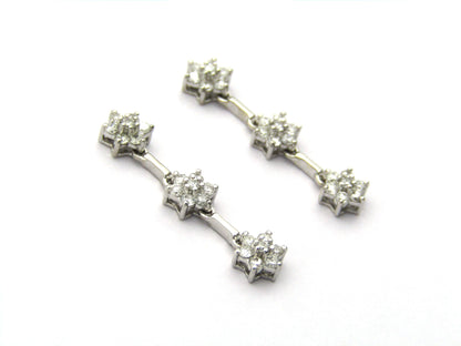 18K Gold diamond flower drop earrings by Browns