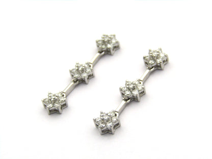 18K Gold diamond flower drop earrings by Browns