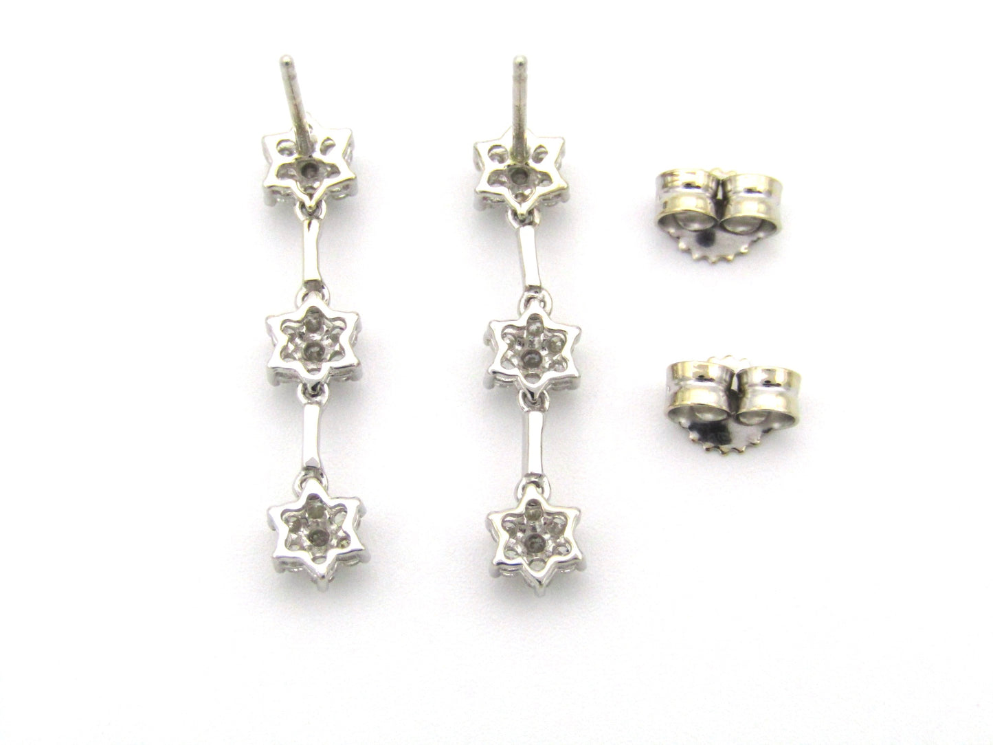 18K Gold diamond flower drop earrings by Browns