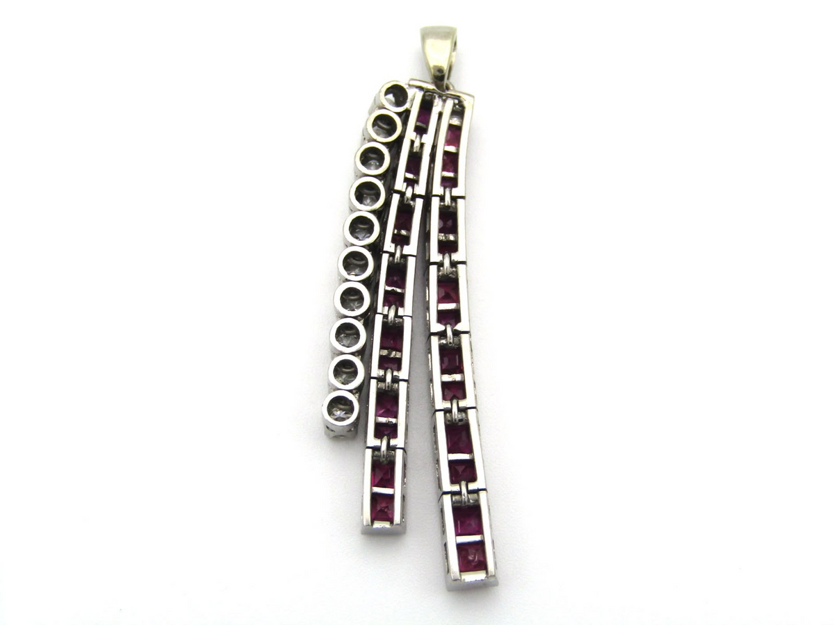 18K gold Art Deco Burmese ruby and diamond articulate pendant, circa 1920's.