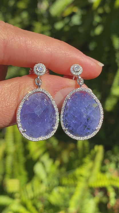 18K gold tanzanite and diamond drop earrings by Jack Friedman.