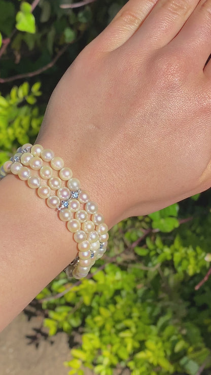 18K gold three-strand akoya cultured pearl bracelet, circa 1980's.