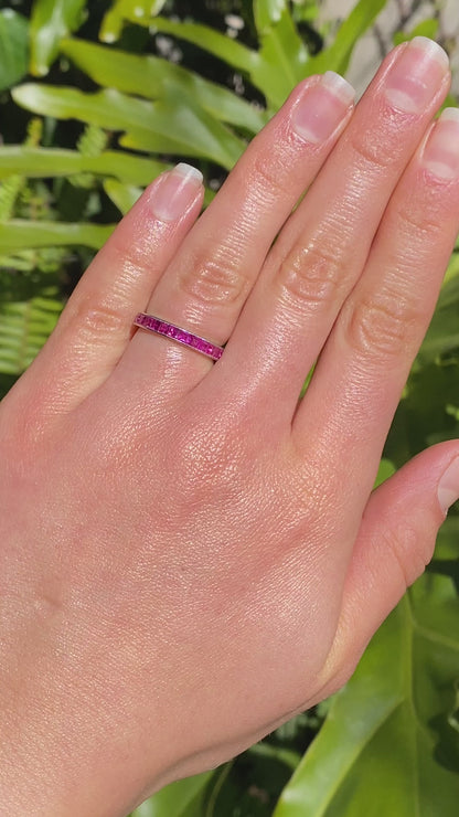 Platinum synthetic ruby eternity ring, circa 1990's.