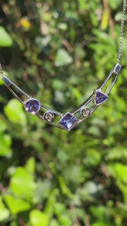 18K gold tanzanite and diamond necklace.