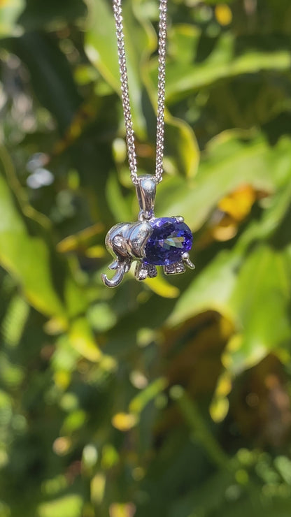 18K gold tanzanite and diamond elephant pendant.