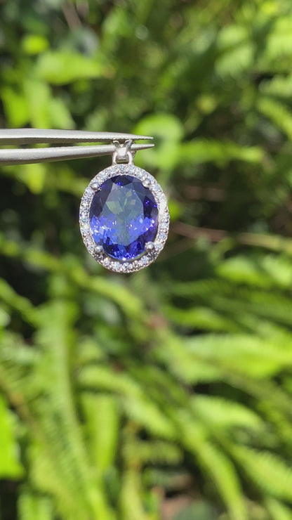 18K gold tanzanite and diamond pendant.