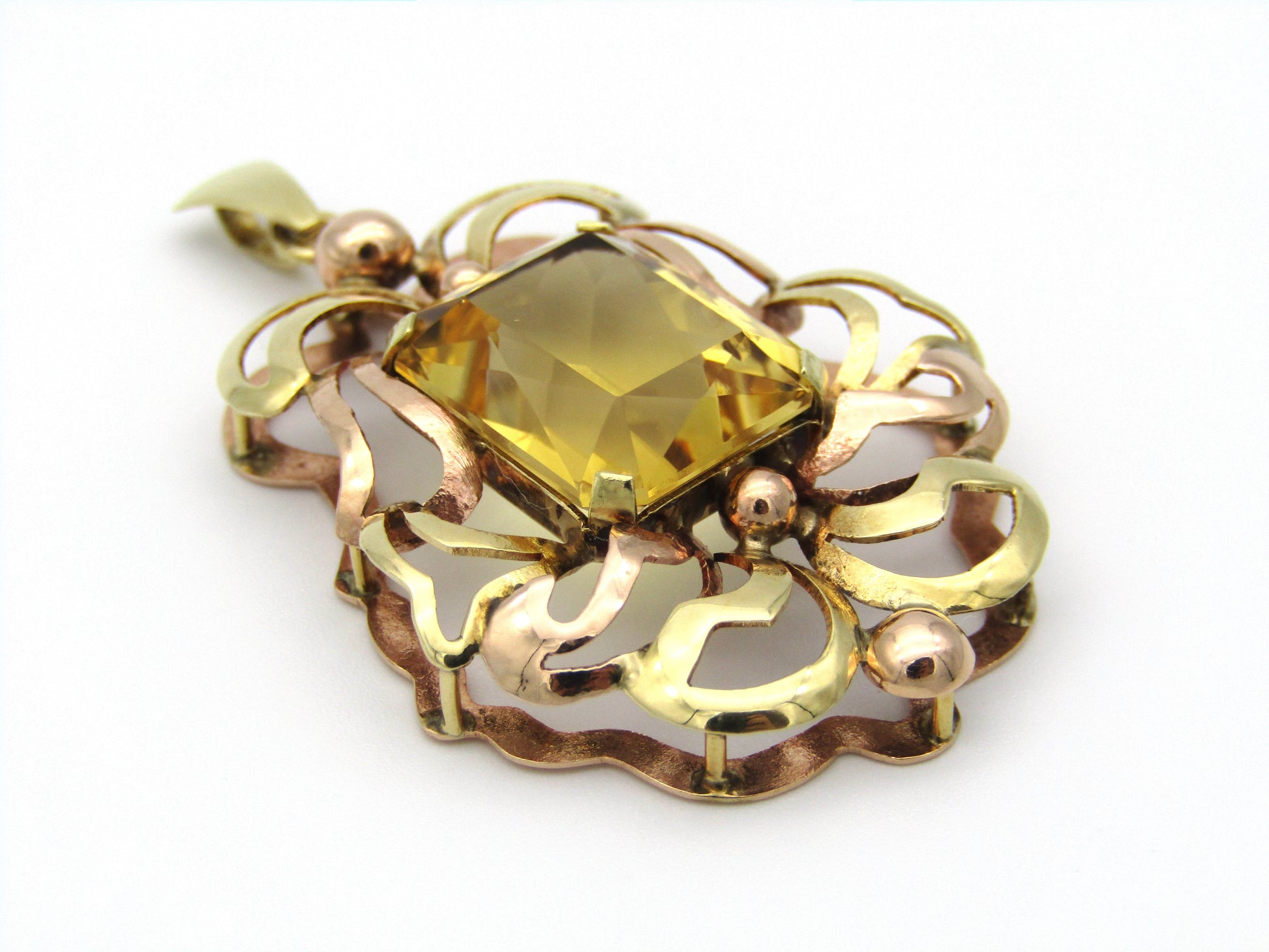 14kt yellow and rose gold citrine pendant.