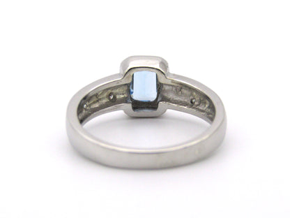 9K gold blue topaz and diamond ring by Browns.