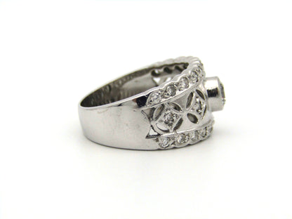 18kt gold diamond ring by Jenna Clifford.