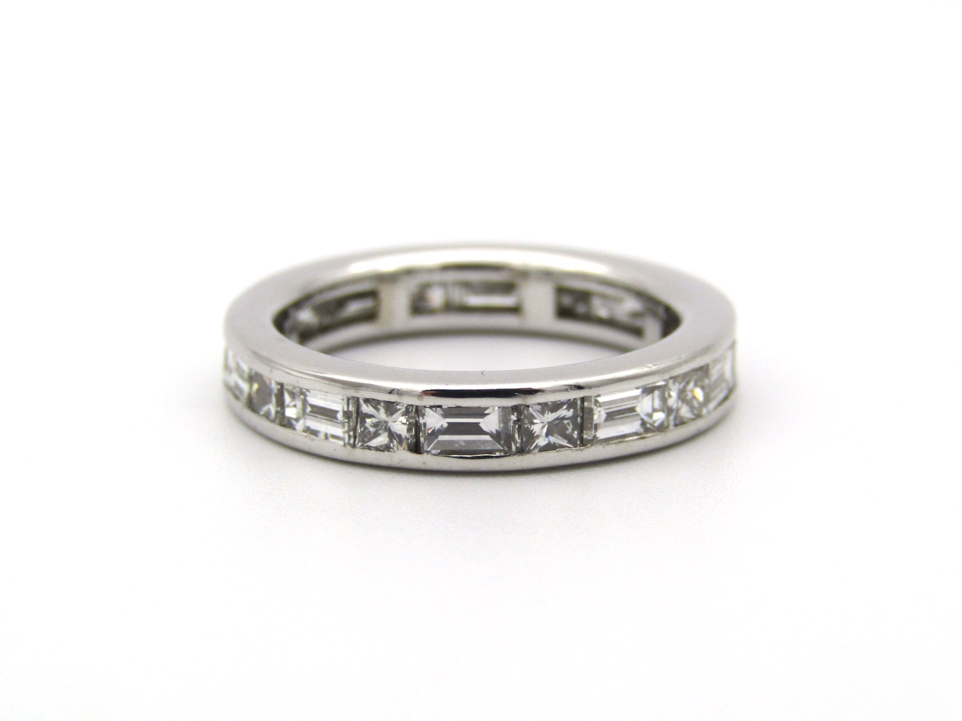 18K gold diamond eternity ring.