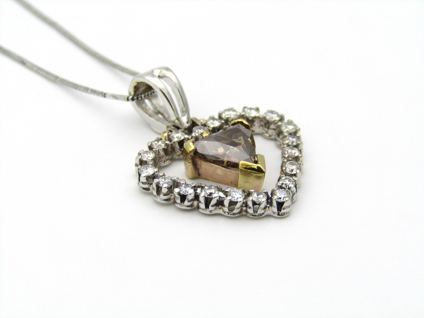 18kt gold cognac diamond pendant.