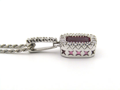 14kt white gold Pink Tourmaline and diamonds pendant.