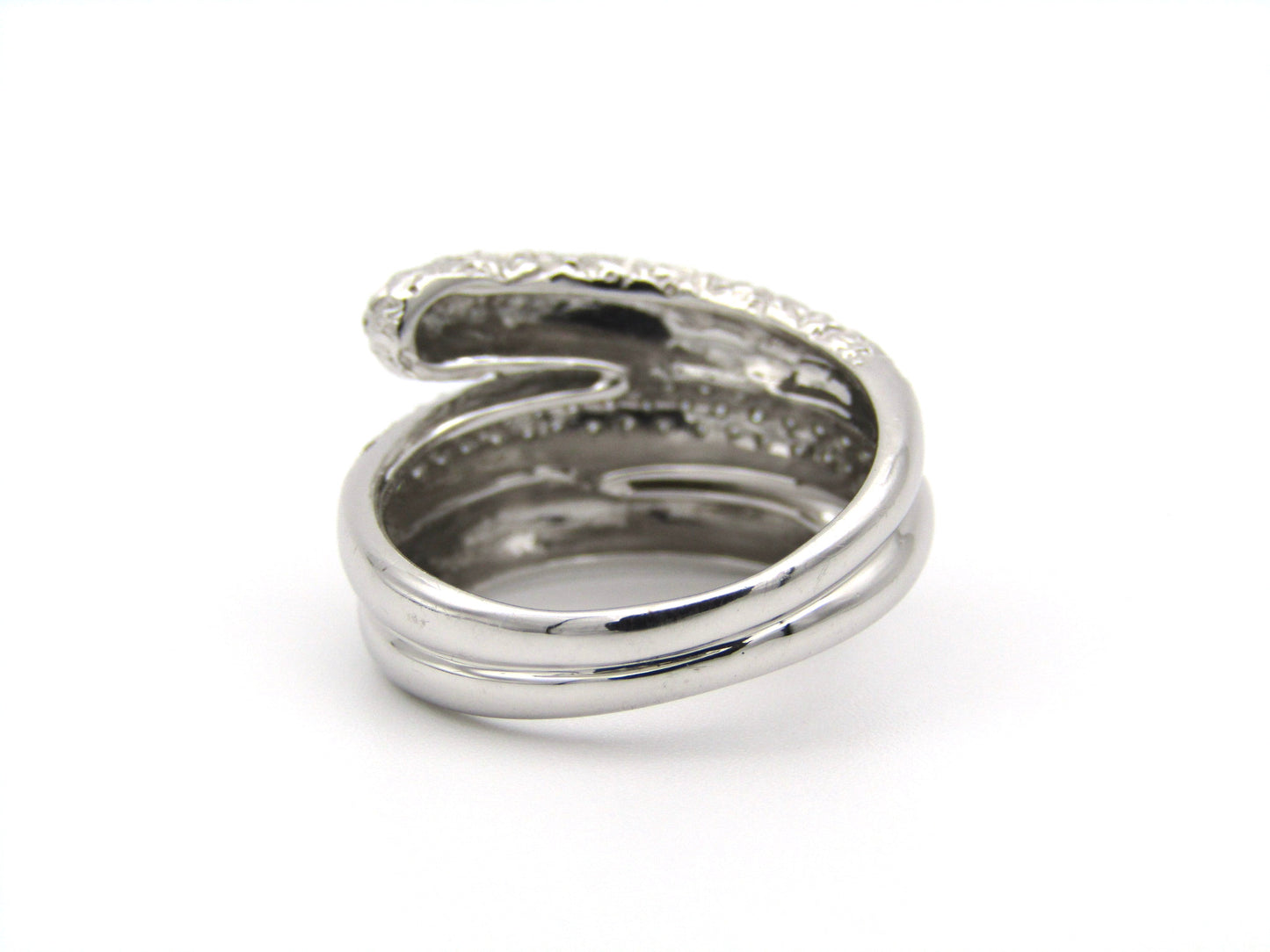9K gold diamond twist ring.