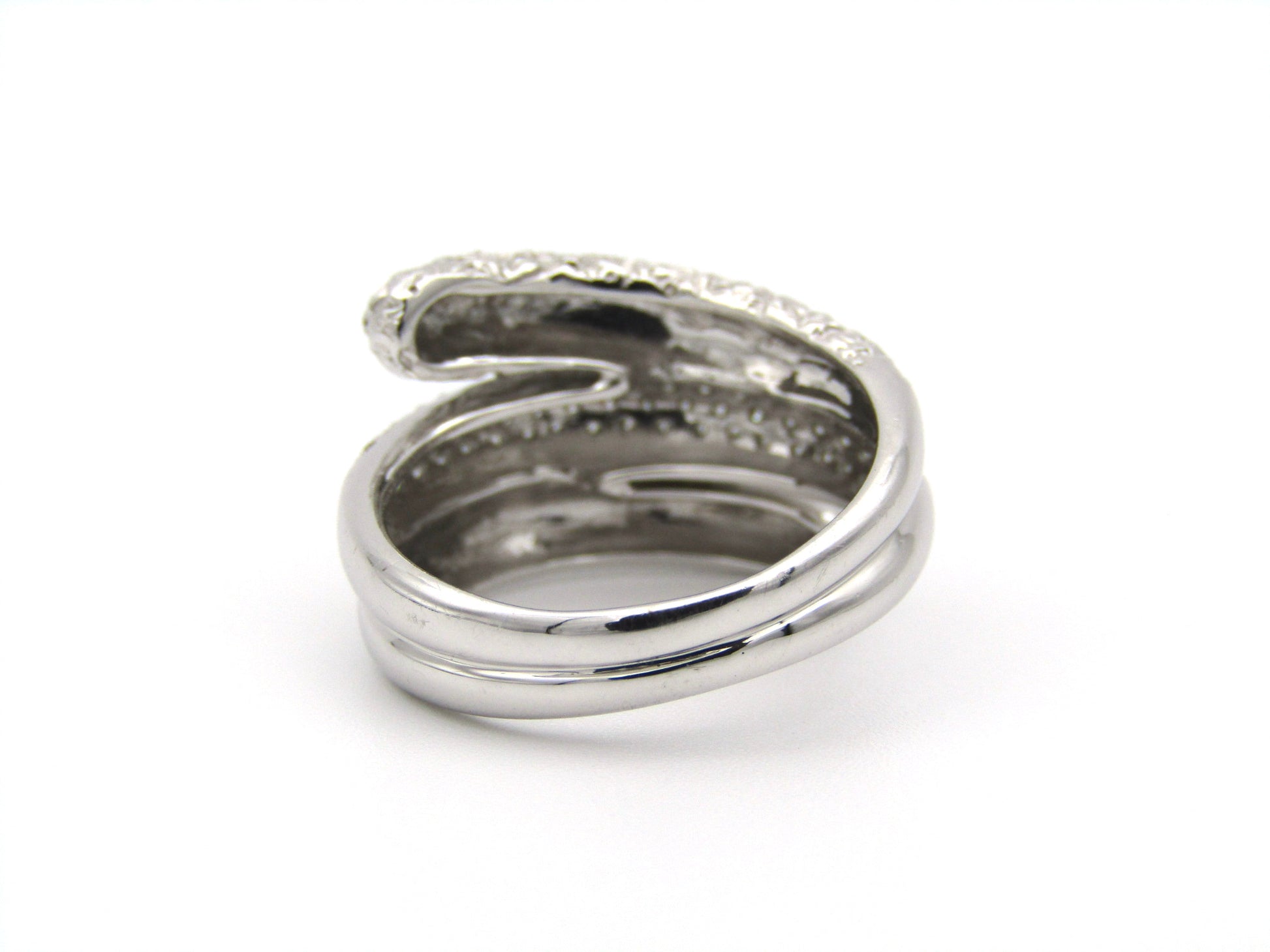 9K gold diamond twist ring.
