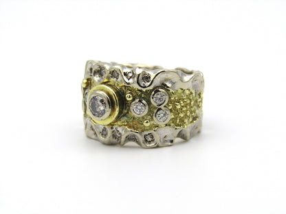 18kt gold diamond ring.
