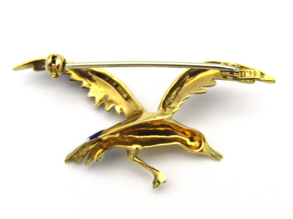 18kt gold diamond and enamel "Bird in flight" brooch.
